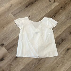 Cute white dress shirt with v- back and tie bow